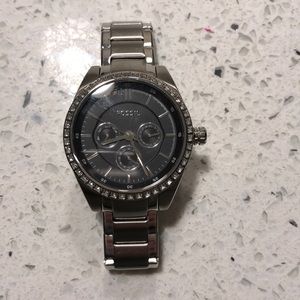 Silver fossil watch